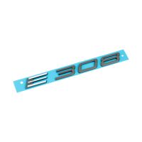 Emblema con la scritta 308 sul retro